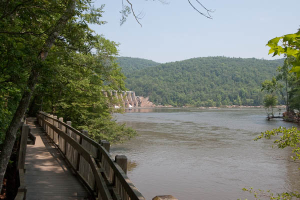 Photo of the view of the dam from a wooden boardwalk