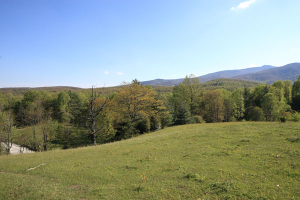 Photo looking back at Pilots Knob and Grandfather Mountain