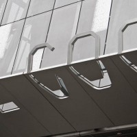 Detail photo of the positive/negative street signage